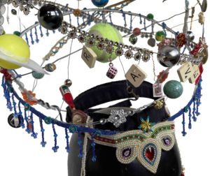Close up of solar system / games themed headdress